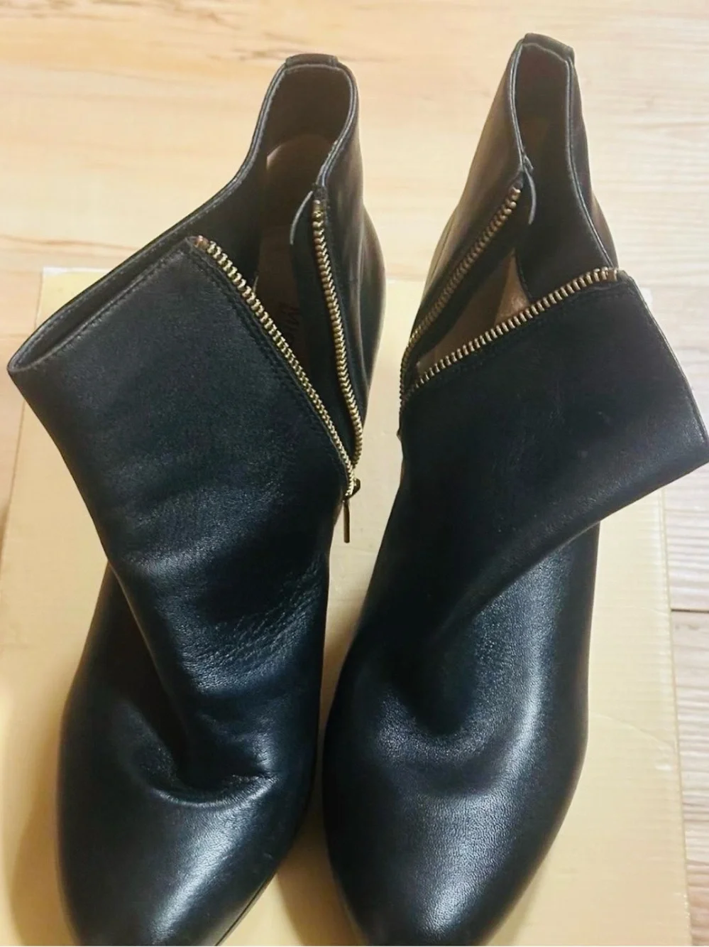 Michael Kors Sammy Platform Black Leather Ankle Booties with Gold Zipper.